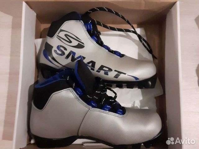 Лыжные ботинки и лыжи karhu новые