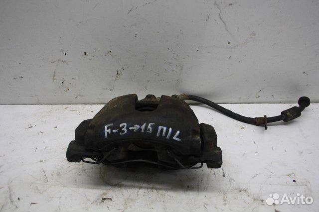 Суппорт передний левый Ford Focus III (2011—2015)