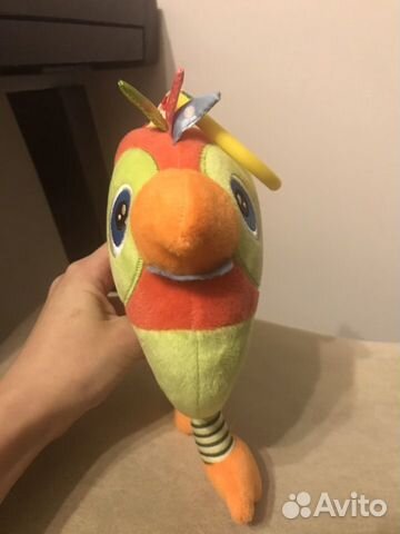 Игрушка музыкальная попугай Яша Игрушка музыкальная попугай Яша