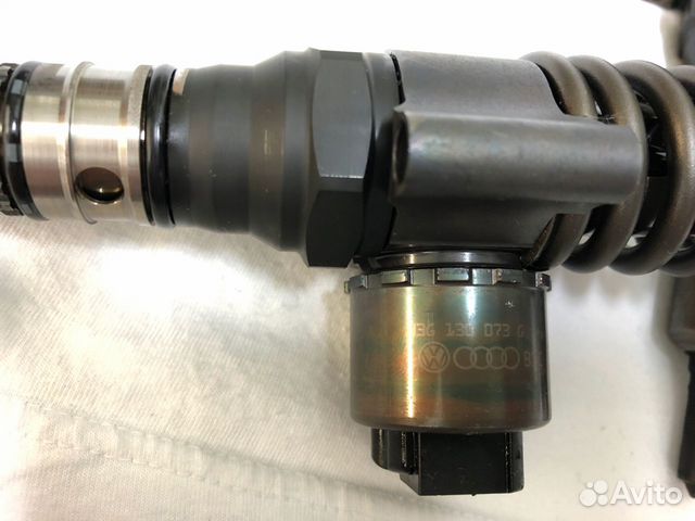 Форсунка 03G130073G VolksWagen Passat Touran 2.0
