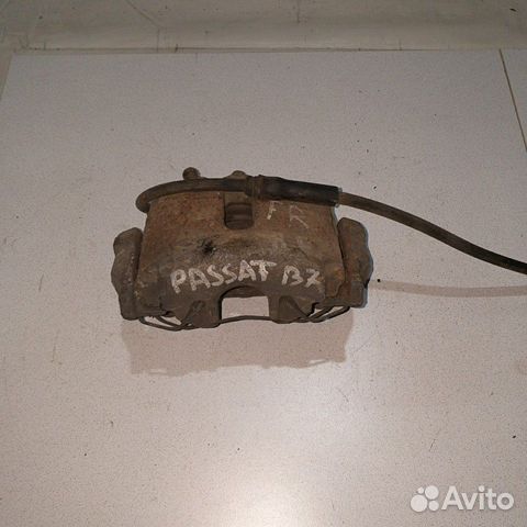 Суппорт тормозной передний Volkswagen Passat B7