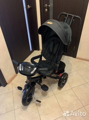 Трехколесный велосипед с ручкой