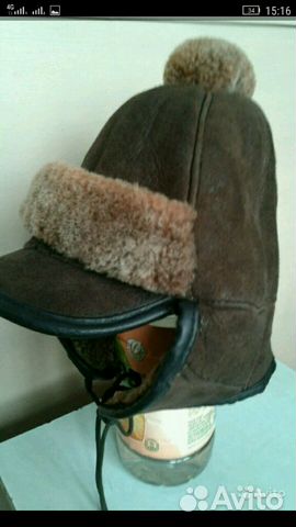2 меховые шапки и меховые рукавички.Цена за всё