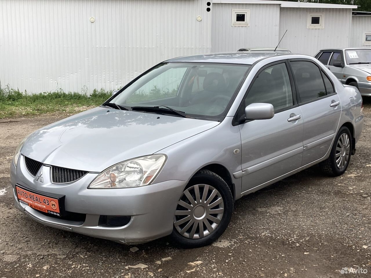 Mitsubishi lancer 2004 год