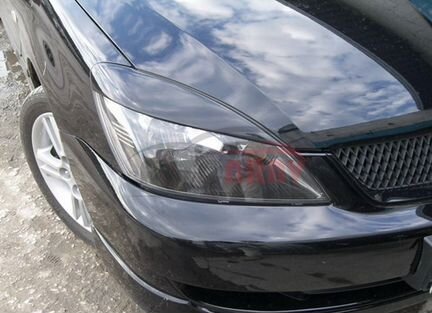 Реснички Evo Light на фары Mitsubishi Lancer 9(IX)