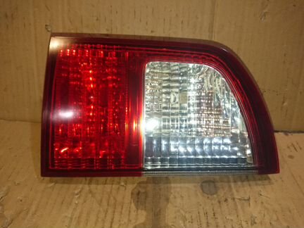 Фонарь в крышку багажника внутренний левый
