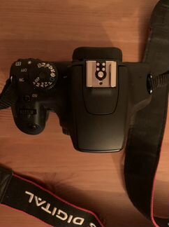 Зеркальный фотоаппарат canon 1000d body